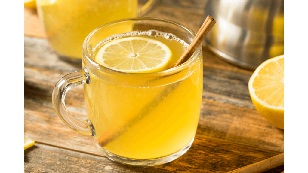 Virgin toddy with lemon and cinnamon stick